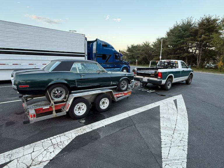 1968 Ford Mustang coupe with black vinyl roof on the trailer in Philadelphia